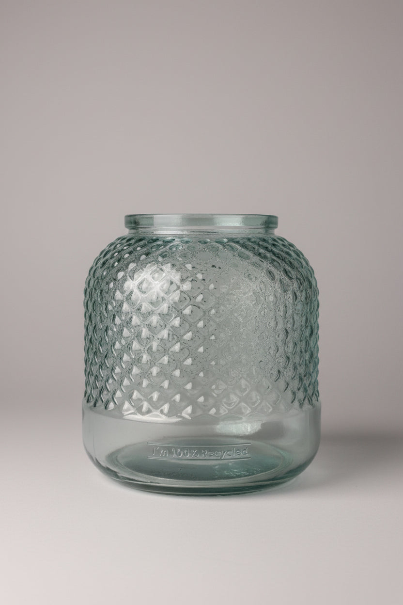 Diamond cut recycled glass bowl vase in smoky teal on a wooden surface