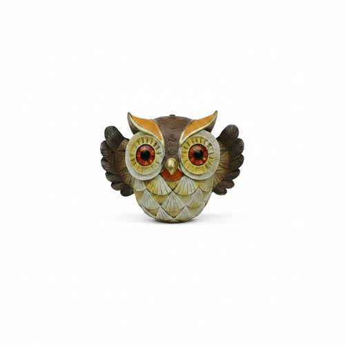 Hand-painted decorative resin owl figurine with amber eyes, gold accents and spread wings