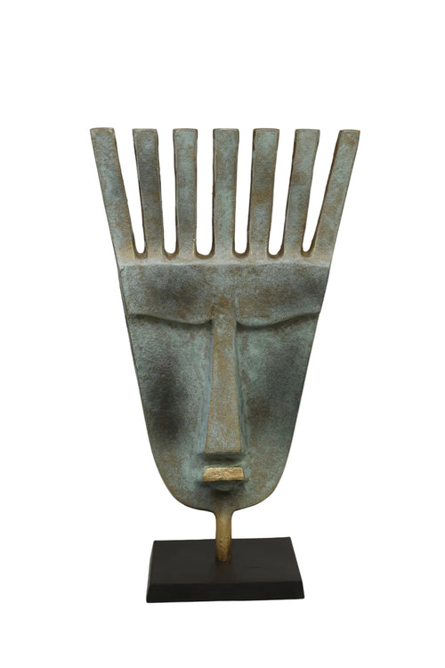 Abstract tribal face mask sculpture with verdigris bronze patina on matte black stand - three quarter angle