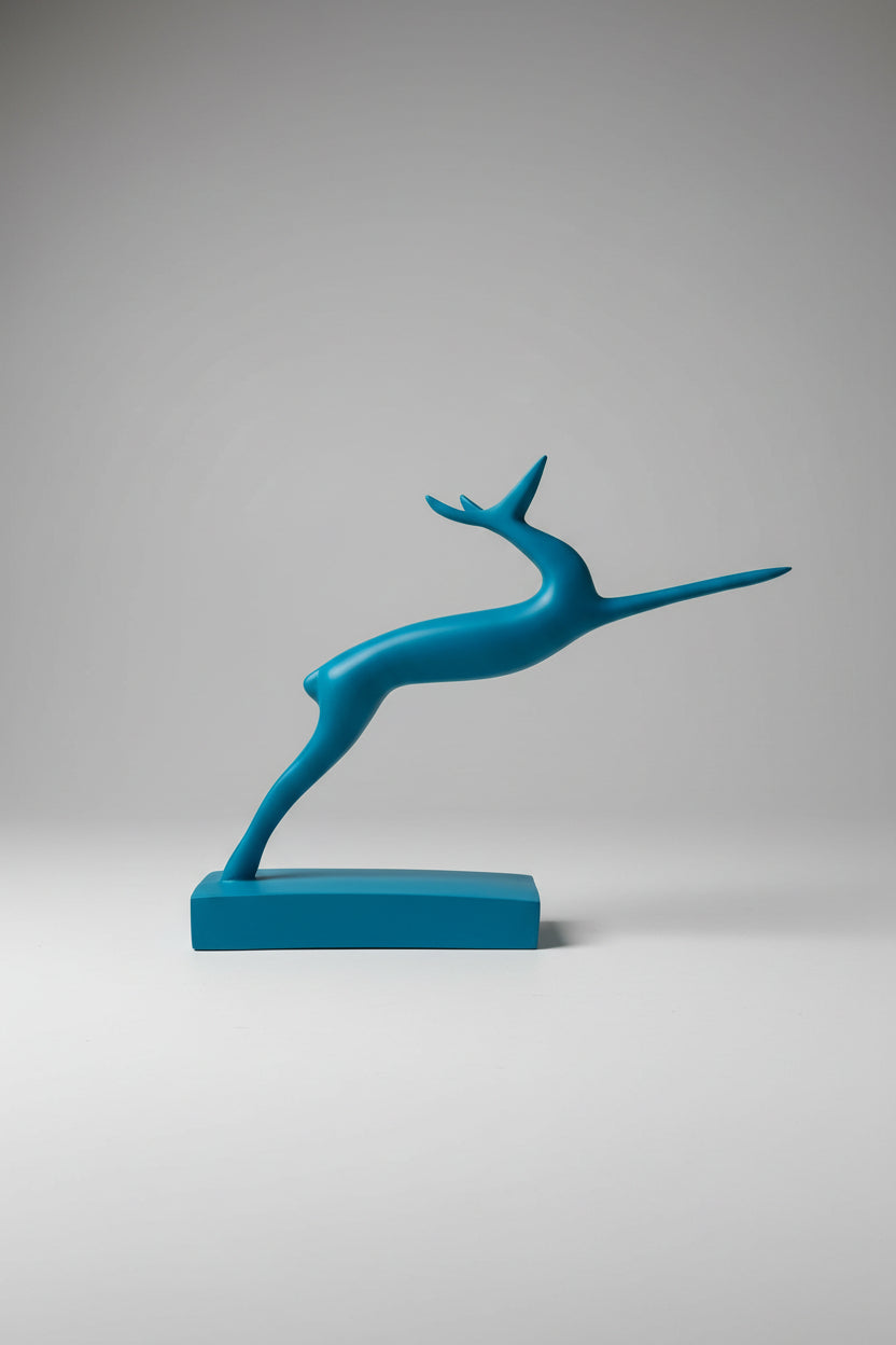 Abstract leaping gazelle sculpture in teal matte finish on matching base