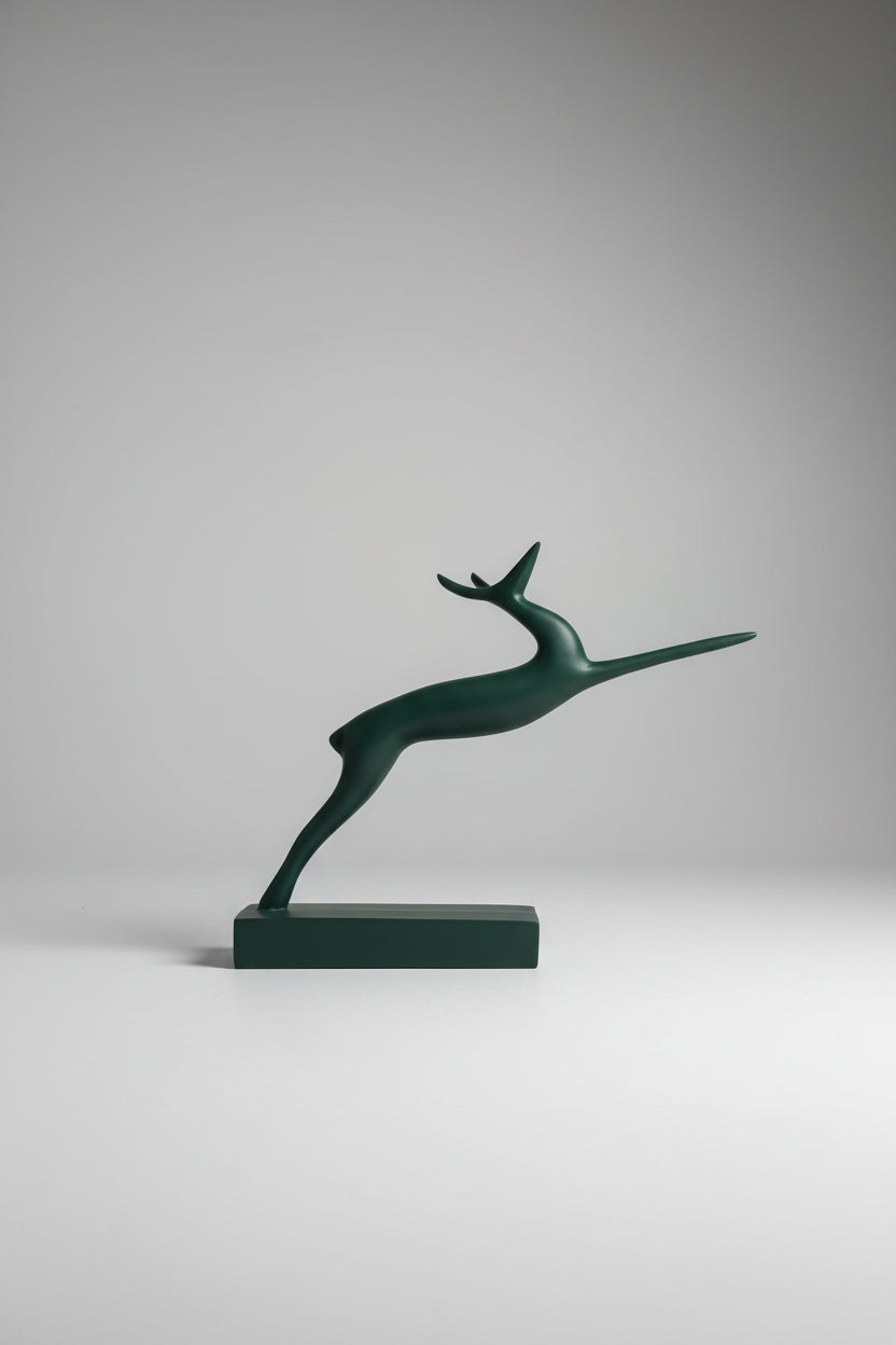 Abstract leaping gazelle sculpture in forest green matte finish on matching base