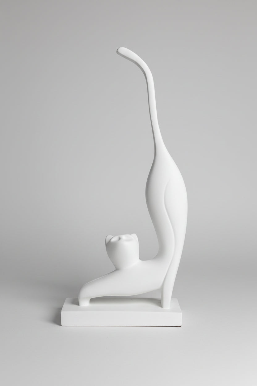 Abstract stretching cat sculpture in white matte finish on matching base